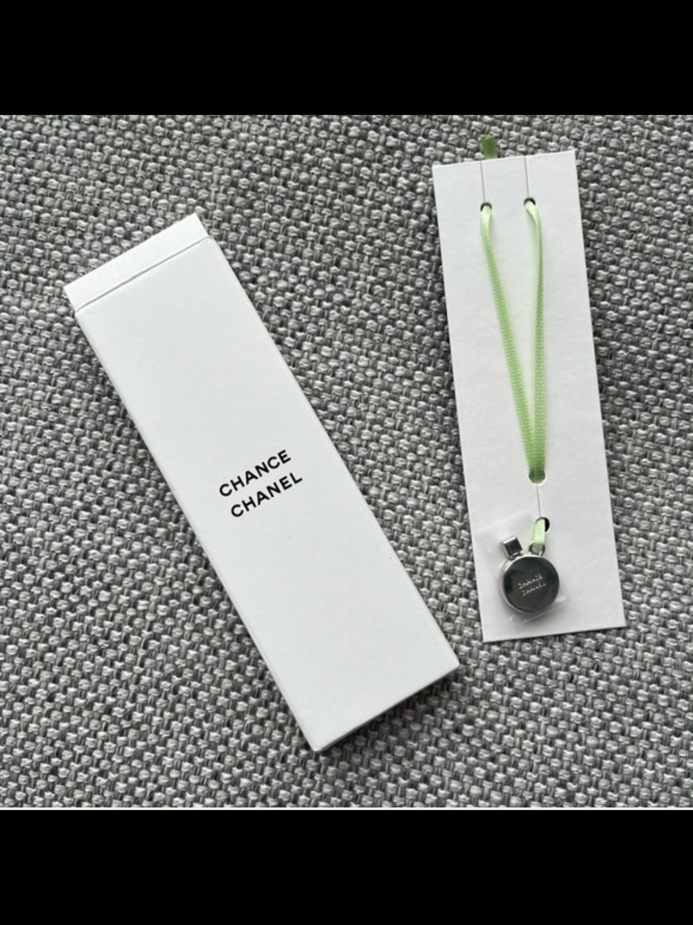 CHANEL Silver Round Pendant Necklace with Light Green Cord